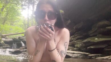Public Outdoors: Dildo Deep Throat by the Waterfall