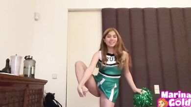 Horny cheerleader masturbates with her fingers until she cums