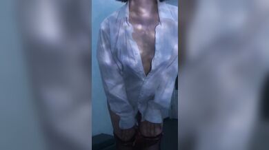 A brunette babe in an exquisite sex suit.