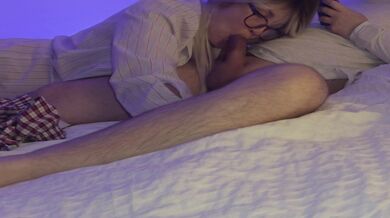 Stepmom sucks stepson's dick while he works on the phone and swallows all his cum