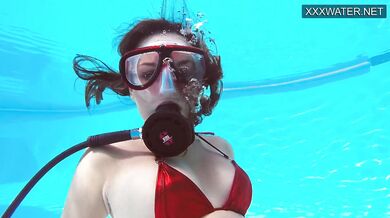 Very juicy hot teen in red swimsuit orgasming underwater