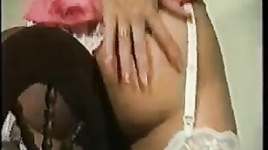 Teresa May in maids outfit