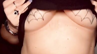 Let me tease you with my big gothic tits.