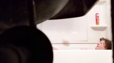 Fat Grandma Christine Krug washing her body.