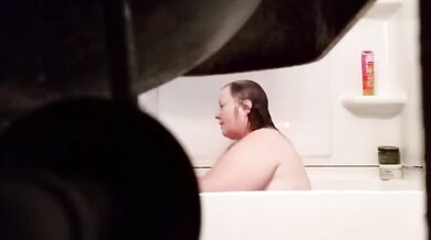Fat Grandma Christine Krug washing her body.