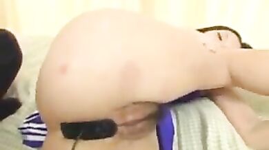 Asian cheerleader Kaoru Mugi exposes shaved pussy for insertions