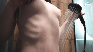 You can always watch water flowing down the delightful body of this girl