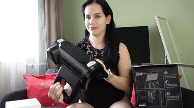 Mistress Anna unpacks the XSpaceCup masturbator and tests it on her slave