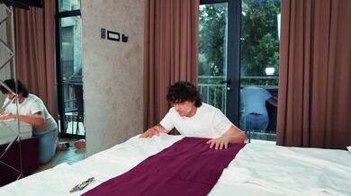 Sharing a bed in a hotel room with a hot milf