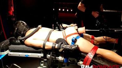 RAWBONDAGE - Chained jock lying face down being fisted in his ass