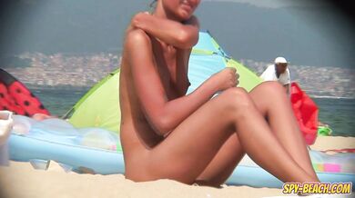 Amateur Beach Nudist Voyeur - Close Up Shaved Pussy