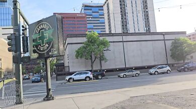 Wife shows off her naked tits walking through the city with her husband.