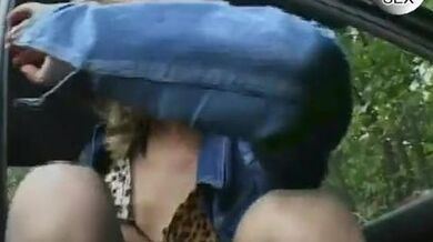 Blonde teen playing in the car