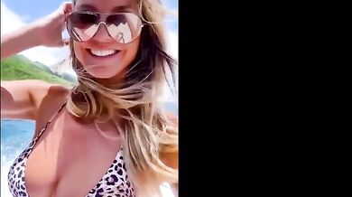 Heidi Klum Breasts Scene in Heidi Klum Leporad Print Bikini Top