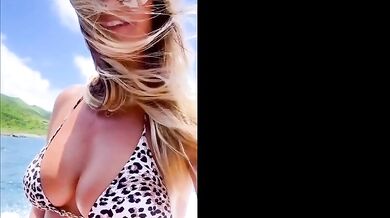 Heidi Klum Breasts Scene in Heidi Klum Leporad Print Bikini Top