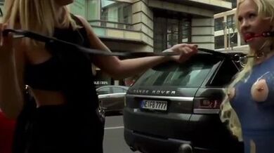 Blonde in bondage fisted in public cafe