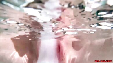 Redhead MILF masturbating outside with a huge toy made out of ice