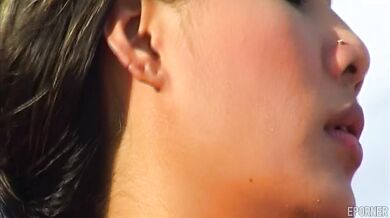 Naked Sunbathing On Beach