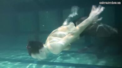 Lozhkova in see through shorts in the pool