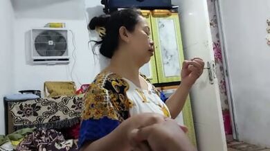 OLD MOTHER AND YOUNG INDONESIAN