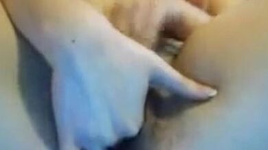 Two fingers is what her hairy juicy pussy wants