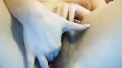 Two fingers is what her hairy juicy pussy wants