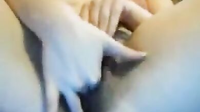 Two fingers is what her hairy juicy pussy wants