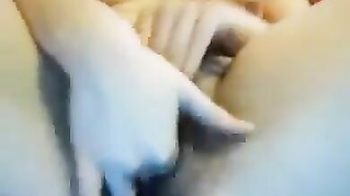 Two fingers is what her hairy juicy pussy wants