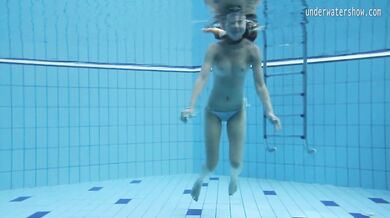 Small tits petite teen Clara underwater