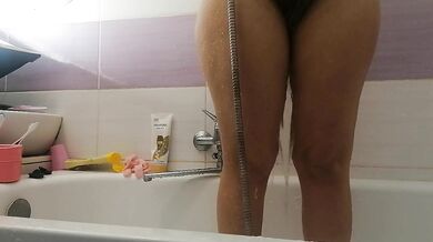 Sexy mom washes herself, hairy pussy, big ass, big tits.
