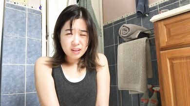 Asian Girl Wets Her Shorts