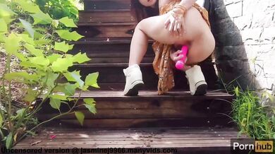 Shaved Asian Pussy with Big Clit Masturbates at the Outdoor Steps and Gets Creamy Squirt