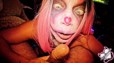 Sexy Milf Clown sucks a big dick before her silly clown pussy gets filled.