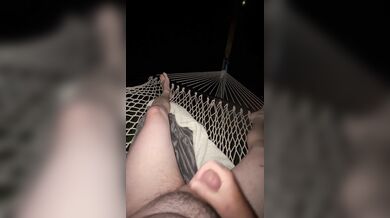 Masturbating outdoors in hammock during lightning storm
