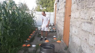 Malvina the cat and I are playing barrel ball