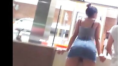 Candid latina bend over skirt