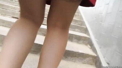 Red dress and fishnet stockings