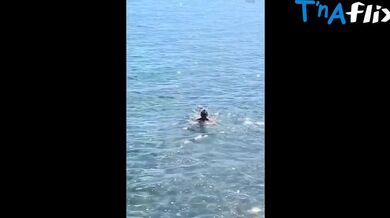 Elizabeth Hurley Butt, Breasts Scene in Elizabeth Hurley Sizzles In Sexy Bikini At Beach Party