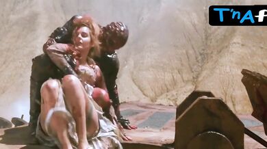 Frederique Feder Breasts Scene in Mutant Action