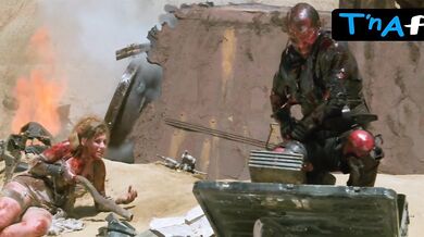 Frederique Feder Breasts Scene in Mutant Action