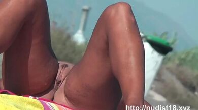 Real amateur nudist hotties with naked pussy at the beach