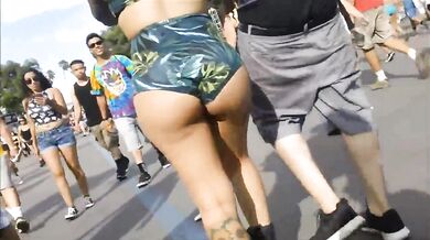 big booty brunette green cheeky shorts