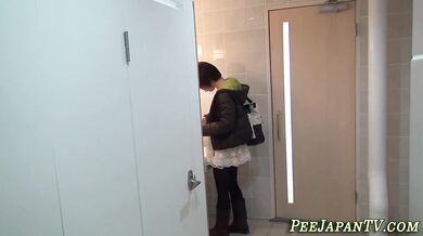 Asian teen filmed pissing
