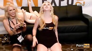 Samantha Rone squeals riding the Sybian in the booth at 2015 AVN