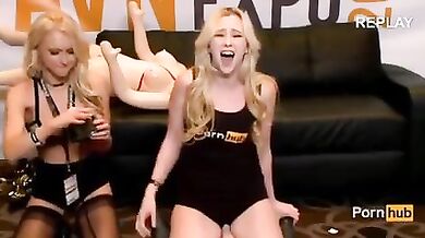 Samantha Rone squeals riding the Sybian in the booth at 2015 AVN
