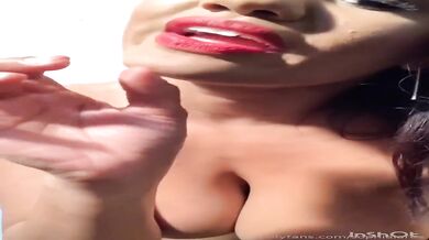 Sexy busty pierced booty girl posing