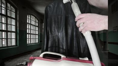 Vacuuming Girlfriend's Italian Leather Cute Jacket with vintage Electrolux Vacuum Cleaner