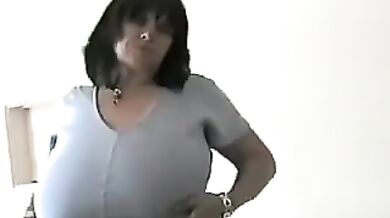 Busty granny MILF in crotchless stockings and huge boobs