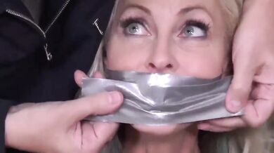 Two girls bound and gagged in boots