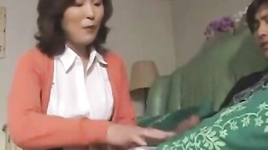 Horny Asian Milf Sees Young Guy Masturbating